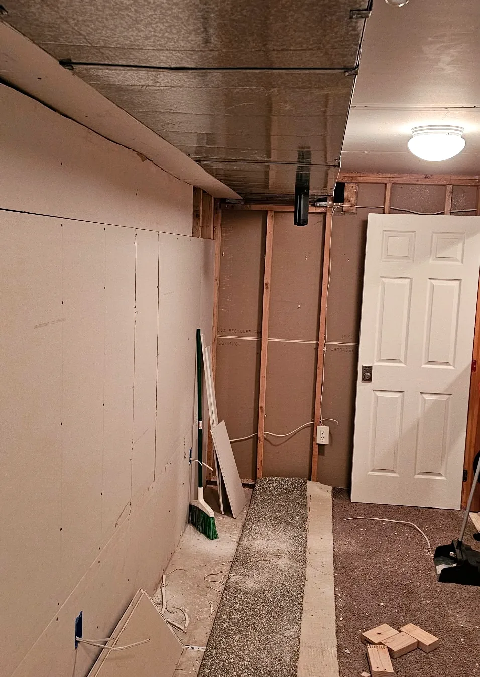 Framing and new drywall going up during a remodel